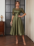 Paloma Wren Olive Green front view wedding guest dress