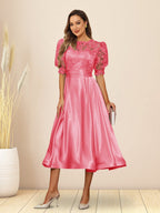 Paloma Wren Coral front view wedding guest dress