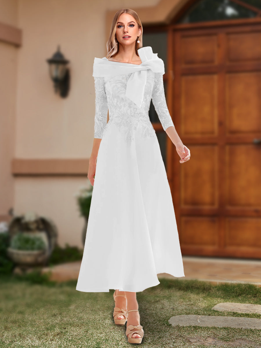 Ursula Ivory front view wedding guest dress