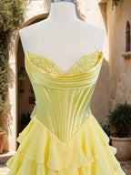 Maristella yellow side view prom dress