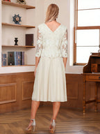Wendy Claire Champagne back view mother of the bride dress