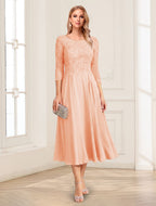Zorina Lane Peach front view mother of the bride dress