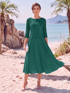 Evelina peacock front view mother of the bride dress
