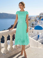 Priscilla Fern Turquoise back view mother of the bride dress