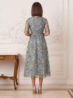 Elara Noelle Dusty Blue back view wedding guest dress