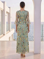 Liora Grace Sage Green back view wedding guest dress