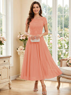 Verena Pearl Coral back view mother of the bride dress