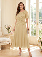 Tabitha Bloom Champagne front view mother of the bride dress
