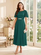 Elodie peacock front view mother of the bride dress
