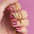 Initiale Pendant Gold front view necklaces