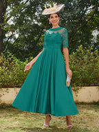Sabrina Claire Peacock front view mother of the bride dress