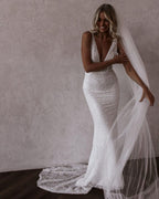 Diamond White Lace Mermaid Wedding Dress with V-Neck Neckline and Sequins