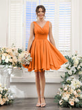 Herminia Wren Orange front view wedding guest dress