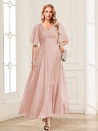 Adora Blush front view wedding guest dress