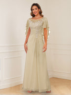 Evadne Claire Champagne front view mother of the bride dress