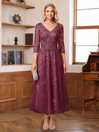 Caroline Claire Plum front view mother of the bride dress
