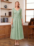 Caroline Claire Sage Green back view mother of the bride dress