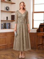 Caroline Claire Taupe front view mother of the bride dress