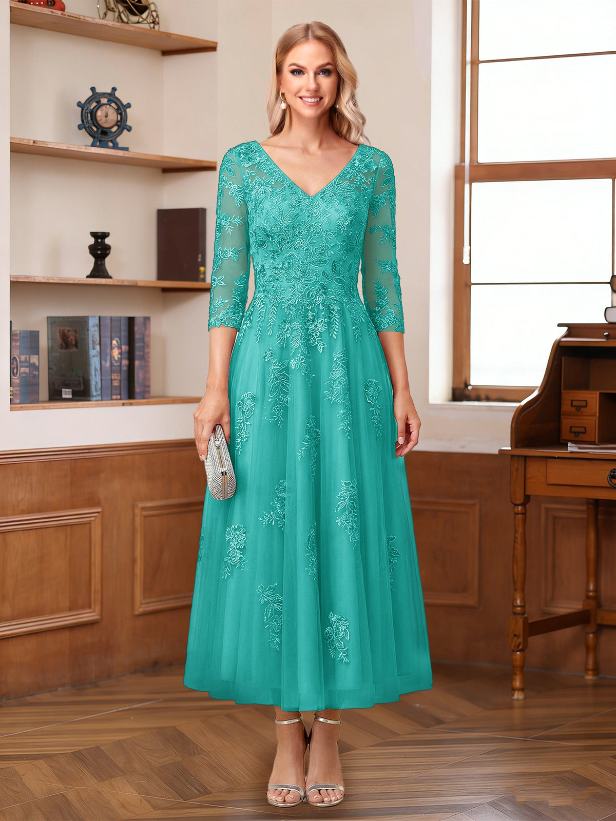 Caroline Claire Turquoise back view mother of the bride dress
