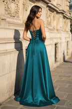 Blythe Corinne Peacock back view prom dress