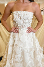 White Lace A-Line Wedding Dress with Strapless Neckline and Floral Detail