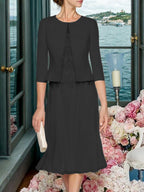 Corinna Faye Black front view mother of the bride dress