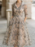 Nerissa Claire Champagne front view mother of the bride dress