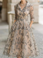 Nerissa Claire Champagne front view mother of the bride dress