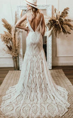 White Lace Mermaid Wedding Dress with V-Neck Neckline and Floral Detail