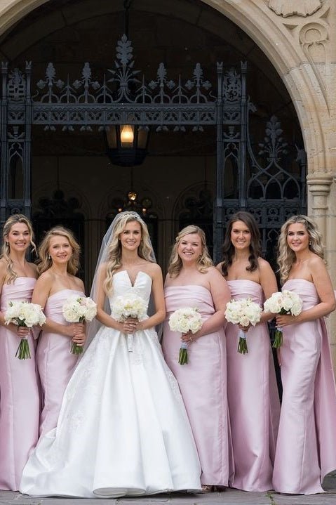Blush Satin Sheath Bridesmaid Dress with Strapless Neckline and Pleated Detail