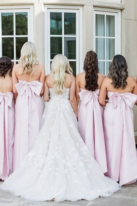 Blush Satin Sheath Bridesmaid Dress with Strapless Neckline and Pleated Detail