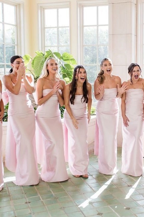 Blush Satin Sheath Bridesmaid Dress with Strapless Neckline and Pleated Detail