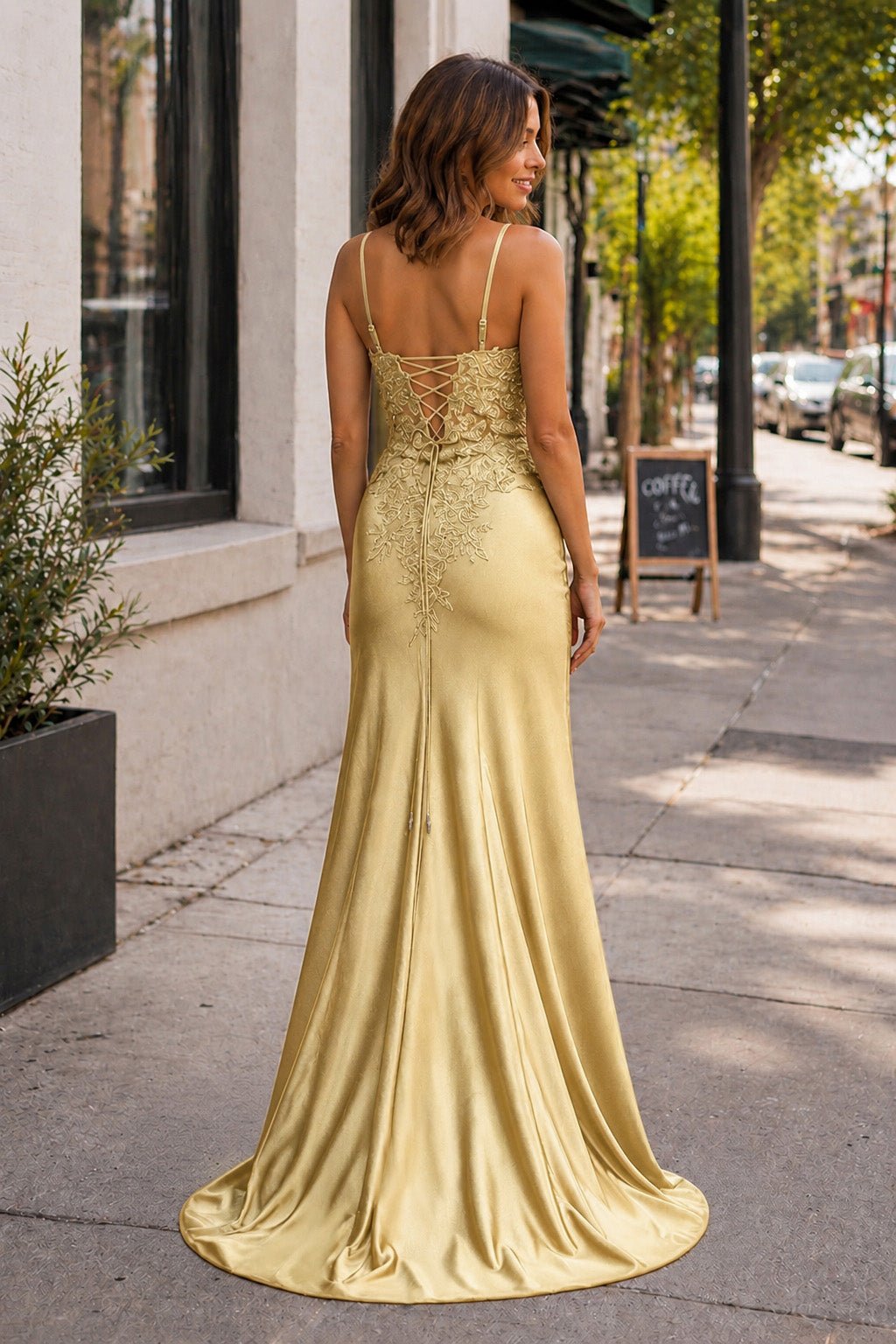Clarimond gold back view prom dress