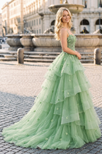 Althea Sage Green ball gown prom dress side view with sweep train